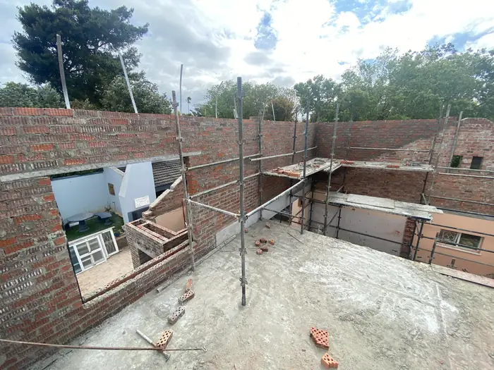 Brickwork and scaffolding on the new upper floor at House Braeview