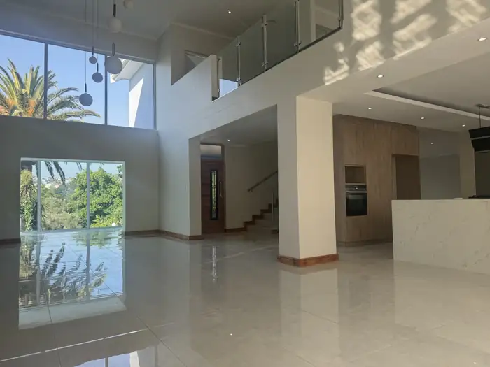 The double volume living area with full height glazing