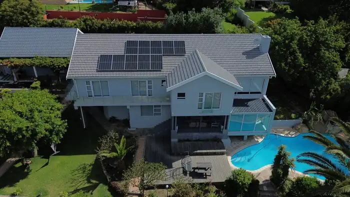 House Braeview from the air, the rebuilt double storey with the pool and garden below it