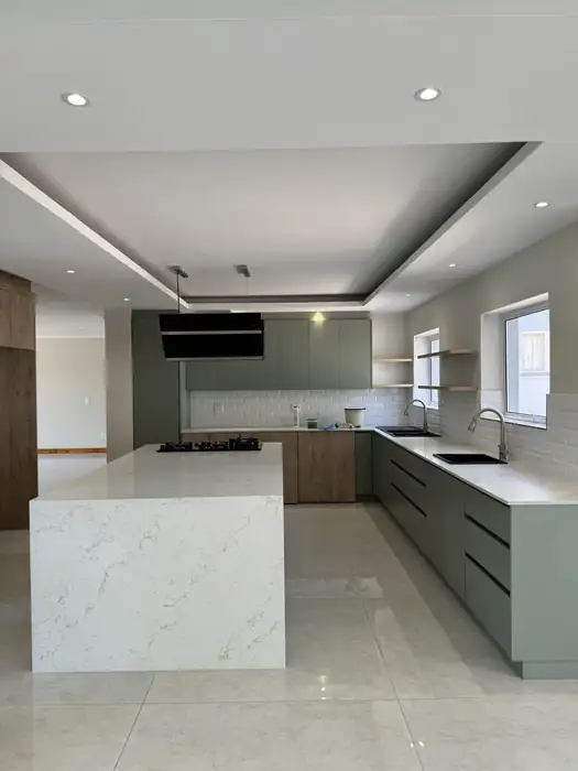 Bulkhead ceiling and downlights over the kitchen