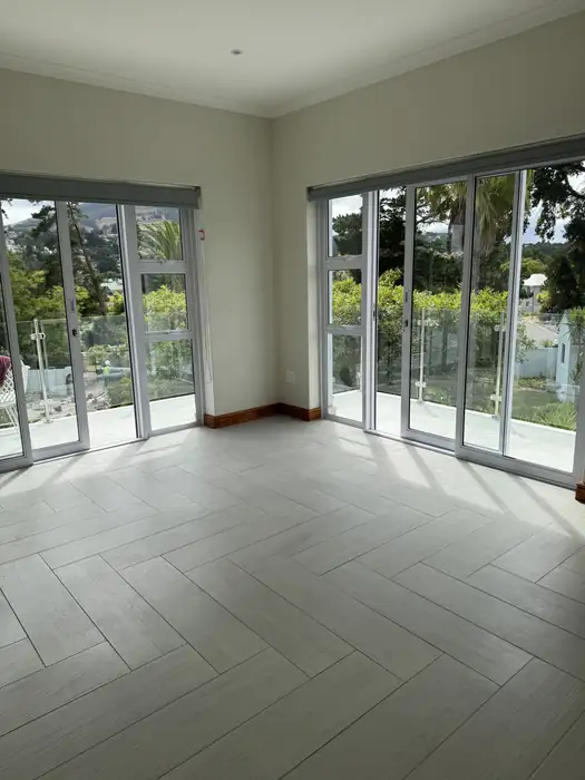 A ground floor room opening onto the garden through sliding doors