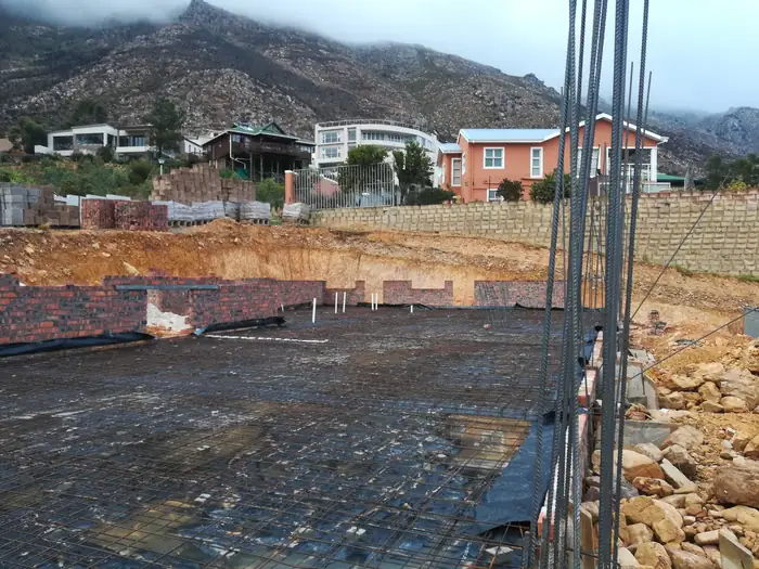 Reinforcing laid over the foundation platform at House Chapman