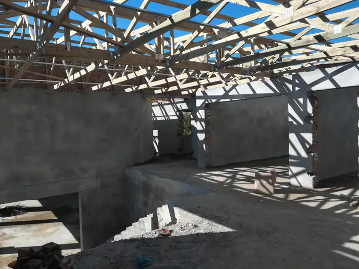 The timber roof structure over the open plan level at House Chapman