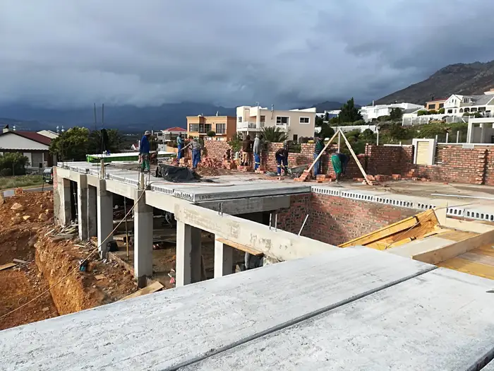 The slabs in place at House Chapman with the mountain beyond