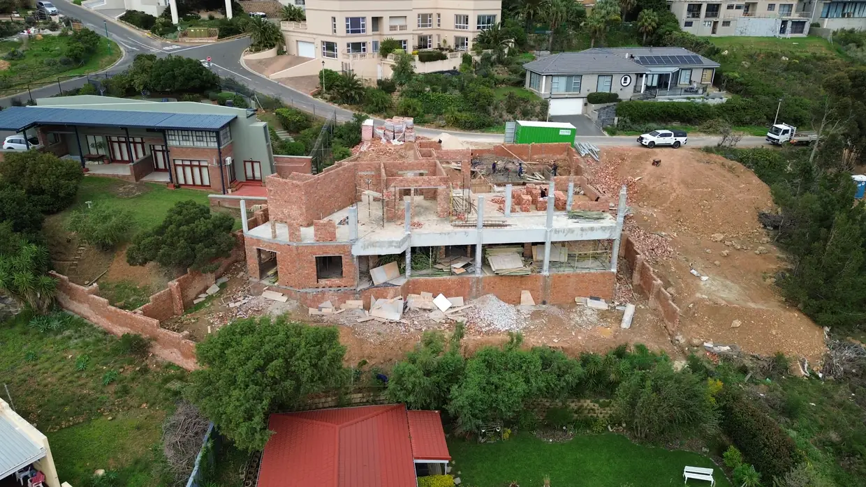 House Makhene during the build, brickwork up and the slab cast