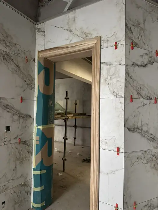 A clad opening with the slab wrapping the reveal