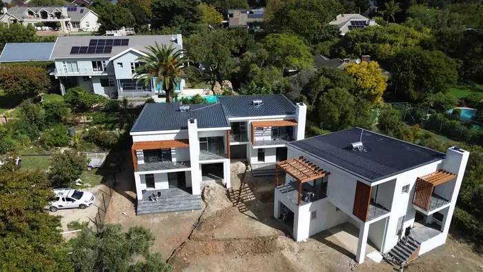 All three houses finished, seen from the air