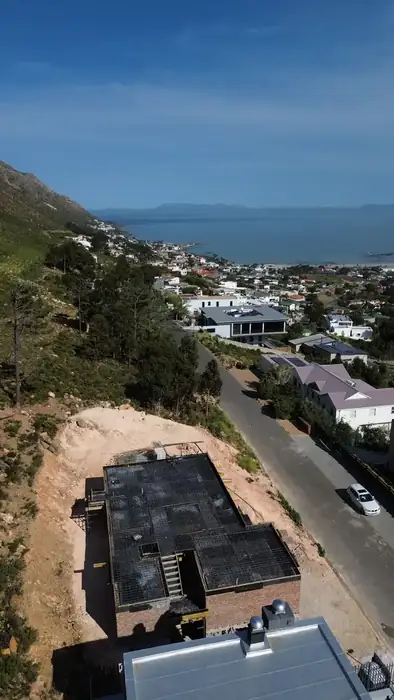 Gordon's Bay and False Bay laid out below the building site