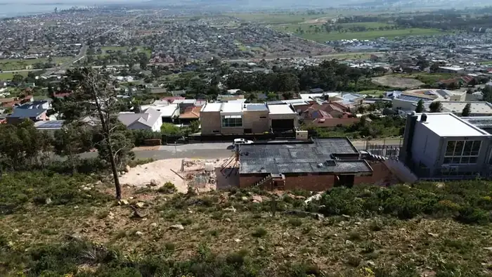 The mountainside site seen in context above Gordon's Bay